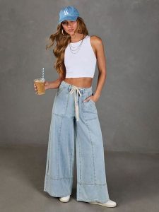 Milan Kiss Dżinsy w kolorze błękitnym rozmiar: S. Niebieskie spodnie z wysokim stanem Milan Kiss, bez wzorów, z bawełny, z podwyższonym stanem. Za 195,99 zł.