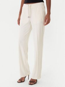 Juicy Couture Spodnie dresowe Tina JCWBJ225307 Beżowy Regular Fit. Brązowe spodnie dresowe Juicy Couture, xs, bez wzorów, z dresówki. Za 399,99 zł.