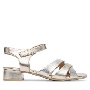 Sandały Caprice. Żółte sandały Caprice, bez wzorów, bez obcasa, na słupku, bez zapięcia. Za 329,99 zł.