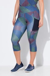Damskie Legginsy funkcyjne 3/4 szybkoschnące. Niebieskie legginsy Ulla Popken, bez wzorów, z elastanu, z podwyższonym stanem. Za 191,99 zł.