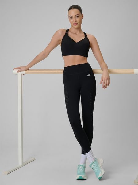 4F Legginsy treningowe szybkoschnące damskie - czarne XL. Czarne legginsy 4f, bez wzorów, z podwyższonym stanem. Za 179,99 zł.