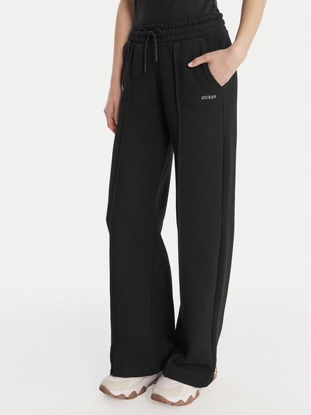 Guess Spodnie dresowe V6RB17 K9V31 Czarny Regular Fit. Czarne spodnie dresowe Guess, s, z aplikacjami, z bawełny. Za 379,99 zł.