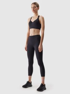 4F Legginsy treningowe z materiału z recyklingu damskie - czarne XS. Czarne legginsy 4f, bez wzorów, z dzianiny. W wyprzedaży za 59,99 zł.