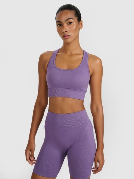 4F Biustonosz treningowy z niskim wsparciem damski - fioletowy XS/S. Czerwone biustonosze 4f, bez wzorów, z dzianiny. Za 99,99 zł.