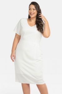 Sukienka elegancka z podszewką i drapowaniem w pasie HILLS ecru. Sukienki KARKO, do pracy, xl, bez wzorów, z elastanu, biznesowe, bez kołnierzyka, bez ramiączek, kopertowe. Za 189,50 zł.