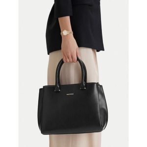 Torebka GINO ROSSI. Czarne kuferki Gino Rossi, bez wzorów, bez dodatków. Za 279,99 zł.