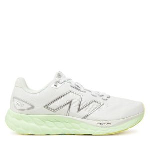 Buty do biegania New Balance. Białe buty sportowe New Balance, bez wzorów, bez zapięcia, do biegania. Za 349,99 zł.
