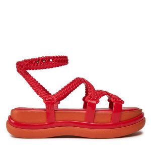 Sandały Melissa. Czerwone sandały Melissa, bez wzorów, bez obcasa, na koturnie, bez zapięcia. Za 259,99 zł.