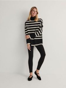 Legginsy z gorsetowym stanem - czarny. Czarne legginsy Reserved, bez wzorów, z dzianiny. W wyprzedaży za 39,99 zł.