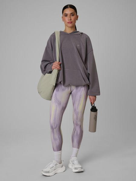 4F Legginsy treningowe szybkoschnące damskie - żółte XL. Żółte legginsy 4f, bez wzorów, z podwyższonym stanem. Za 149,99 zł.