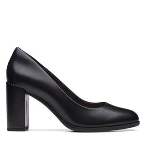 Czółenka Clarks. Czarne czółenka Clarks, bez wzorów, bez obcasa, bez zapięcia. Za 349,99 zł.