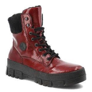 Czerwone Botki Rieker Lakierowane Buty Damskie. Czerwone botki Rieker, bez wzorów, z lakierowanej skóry, bez obcasa, bez zapięcia. Za 399,00 zł.