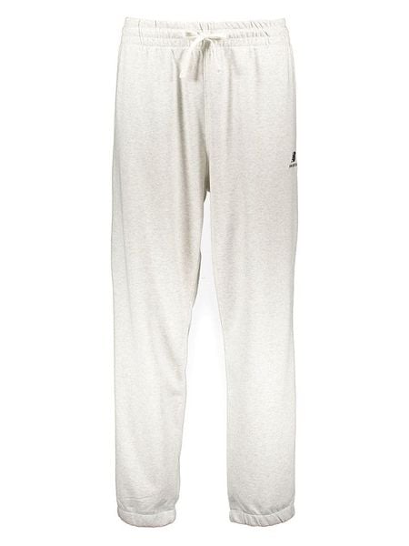 New Balance Spodnie dresowe "Uni-ssentials French Terry" w kolorze kremowym rozmiar: L-XL. Brązowe spodnie dresowe New Balance, l, bez wzorów, z dresówki. Za 139,54 zł.