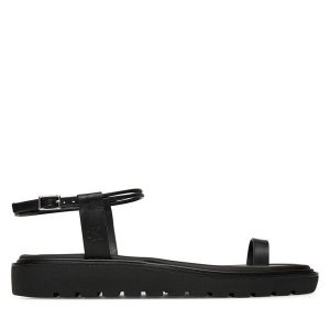 Sandały Calvin Klein Jeans. Czarne sandały Calvin Klein Jeans, bez wzorów, z jeansu, bez obcasa, na płaskiej podeszwie, bez zapięcia. Za 239,99 zł.