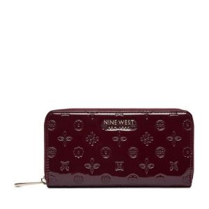 Portfel Nine West. Czerwone portfele Nine West, bez wzorów. Za 89,99 zł.