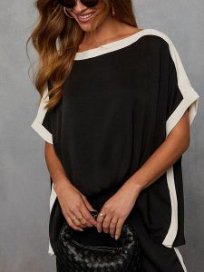 LA Angels Bluzka w kolorze czarno-białym rozmiar: M. Białe bluzki LA Angels, m, bez wzorów, bez kołnierzyka, bez ramiączek. Za 144,92 zł.