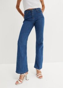 Dżinsy ze stretchem o kroju bootcut, mid waist. Niebieskie spodnie z wysokim stanem bonprix, bez wzorów, z jeansu. Za 84,99 zł.