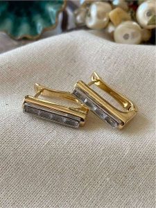 Luseera Pozłacane kolczyki z cyrkoniami rozmiar: onesize. Żółte kolczyki Luseera, z cyrkonią, pozłacane. Za 43,99 zł.