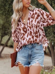 Milan Kiss Bluzka w kolorze jasnoróżowo-brązowym rozmiar: M. Różowe bluzki Milan Kiss, m, bez wzorów, bez kołnierzyka, bez ramiączek. Za 113,90 zł.