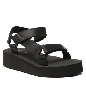 Sandały Jenny Fairy. Czarne sandały Jenny Fairy, bez wzorów, bez obcasa, na płaskiej podeszwie, bez zapięcia. Za 99,99 zł.