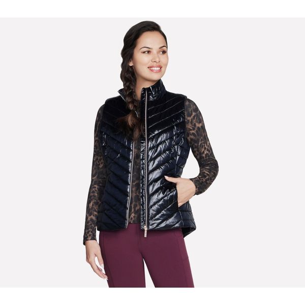 Bezrękawnik Damski Skechers. Czarne kamizelki Skechers, bez wzorów, z puchu, bez kołnierzyka, bez ramiączek, bez kaptura. Za 204,99 zł.