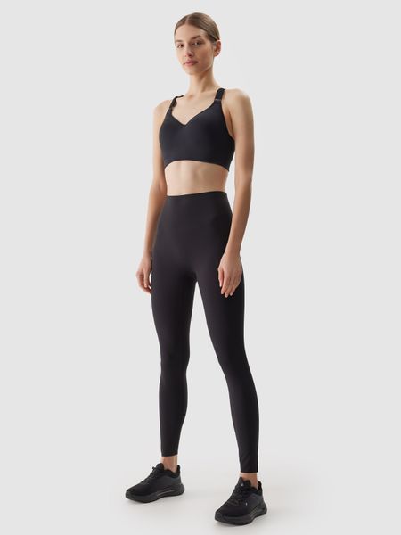 4F Legginsy treningowe szybkoschnące damskie - czarne M. Czarne legginsy 4f, bez wzorów, z dzianiny, z podwyższonym stanem, długie. Za 149,99 zł.