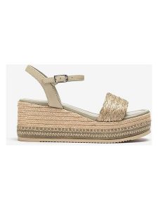 Unisa Sandały w kolorze beżowym na koturnie rozmiar: 39. Brązowe sandały Unisa, bez wzorów, z materiału, z otwartym noskiem, bez obcasa, na koturnie, bez zapięcia. Za 260,99 zł.