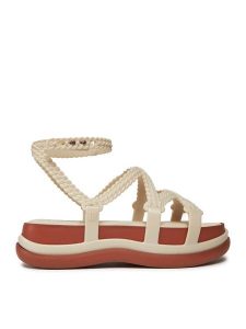 Melissa Sandały Melissa Buzios Ad 33979 Beżowy. Brązowe sandały Melissa, bez wzorów, z tworzywa sztucznego, bez obcasa, na koturnie, bez zapięcia. Za 449,99 zł.