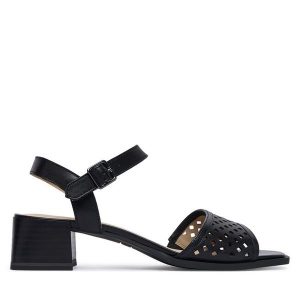 Sandały Caprice. Czarne sandały Caprice, bez wzorów, bez obcasa, na słupku, bez zapięcia. Za 329,99 zł.