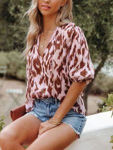 LA Angels Bluzka w kolorze jasnoróżowo-brązowym rozmiar: S. Brązowe bluzki LA Angels, s, bez wzorów, bez kołnierzyka, bez ramiączek. Za 126,75 zł.