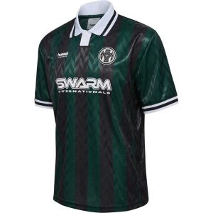 Koszulka Hummel Loose. Zielone bluzki Hummel, bez wzorów, sportowe, bez kołnierzyka, bez ramiączek. W wyprzedaży za 193,50 zł.