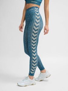 Damskie legginsy bezszwowe Hummel MT Drops. Niebieskie legginsy Hummel, bez wzorów, z dzianiny, z podwyższonym stanem. Za 181,75 zł.