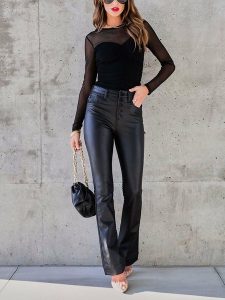 LA Angels Koszulka w kolorze czarnym rozmiar: L. Czarne bluzki LA Angels, l, bez wzorów, bez kołnierzyka, bez ramiączek. Za 109,52 zł.