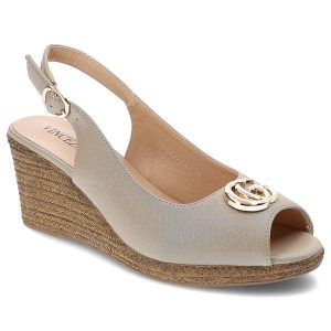 Złote Sandały Vinceza Eleganckie Obuwie Damskie. Żółte sandały VINCEZA, bez wzorów, bez obcasa, na koturnie, bez zapięcia. Za 129,00 zł.