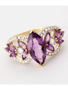 DIAMOND & CO Złoty pierścionek "Vénus" z diamentami rozmiar: 52. Żółte pierścionki Diamond & Co, z ametystem, złote. Za 2 261,40 zł.