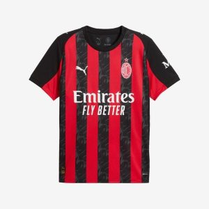 Koszulka piłkarska oficjalna Puma AC Milan 25/26 domowa. Czarne bluzki Puma, l, bez wzorów, z materiału, sportowe, bez kołnierzyka, bez ramiączek. Za 349,99 zł.