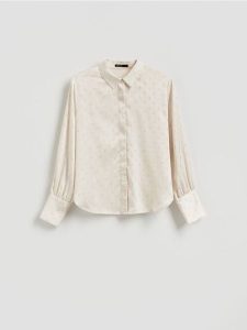 Koszula ze strasem - złamana biel. Koszule Reserved, l, bez wzorów, z tkaniny, bez kołnierzyka, bez ramiączek. Za 159,99 zł.