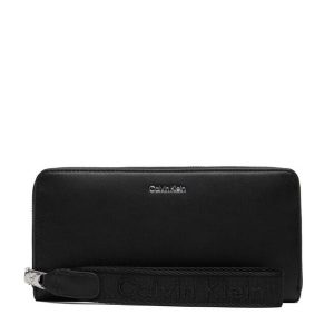 Portfel Calvin Klein. Czarne portfele Calvin Klein, bez wzorów. Za 289,99 zł.