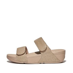 Kobiece klapki na koturnie FitFlop Lulu Adjustable. Brązowe klapki FIT FLOP, bez wzorów, z materiału, bez obcasa, na koturnie. Za 473,00 zł.