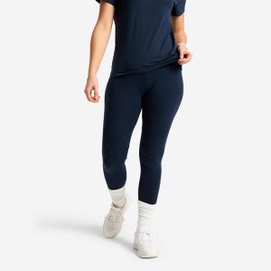 Legginsy sportowe damskie Domyos Essential. Niebieskie legginsy DOMYOS, bez wzorów, z bawełny, długie. Za 19,99 zł.