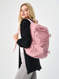 Plecak z kieszenią na laptopa - różowy. Czerwone plecaki Sinsay. Za 49,99 zł.