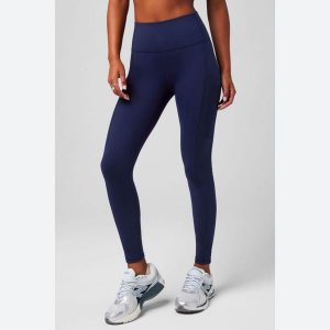 Damskie legginsy Fabletics On-The-Go. Niebieskie legginsy FABLETICS, bez wzorów. Za 326,30 zł.