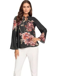 Heine Bluzka ze wzorem rozmiar: 42. Czarne bluzki Heine, bez wzorów, bez kołnierzyka, bez ramiączek. Za 82,83 zł.