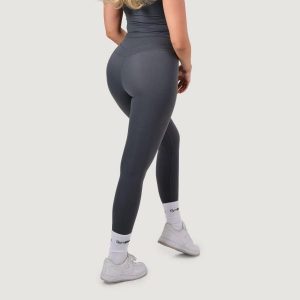 Legginsy damskie fitness z wysokim stanem NEO Iron. Szare legginsy GYMBEAM, bez wzorów, z elastanu, z podwyższonym stanem, długie. Za 112,90 zł.