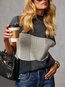 Milan Kiss Sweter w kolorze ciemnoszaro-kremowym rozmiar: L. Czarne swetry oversize Milan Kiss, l, bez wzorów, bez ramiączek. Za 158,10 zł.