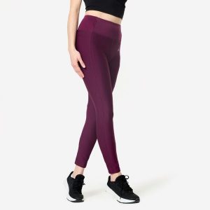 Legginsy fitness damskie Domyos. Fioletowe legginsy DOMYOS, bez wzorów, z elastanu, z podwyższonym stanem. Za 79,99 zł.