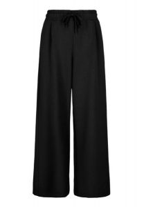 Czarne, luźne spodnie dresowe N-MOCK. Czarne spodnie dresowe Volcano, s, bez wzorów, z dresówki. Za 149,99 zł.