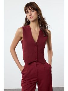 Trendyol Kamizelka garniturowa w kolorze bordowym rozmiar: 40. Czerwone kamizelki Trendyol, bez wzorów, bez kołnierzyka, bez ramiączek, bez kaptura. Za 73,99 zł.