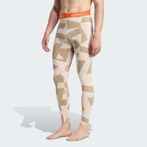 Legginsy bazowe Multi Synthetic Base Layer. Brązowe legginsy ADIDAS, bez wzorów. W wyprzedaży za 142,35 zł.