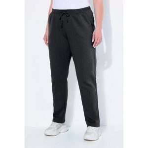 Damskie Spodnie dresowe miękki materiał wewnętrzny elastyczna gumka w pasie. Czarne spodnie dresowe Ulla Popken, plus size, bez wzorów, z bawełny. Za 195,99 zł.